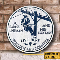 Personalized A Badass Lineman And His Sexy Lady Live Here Wood Round Sign